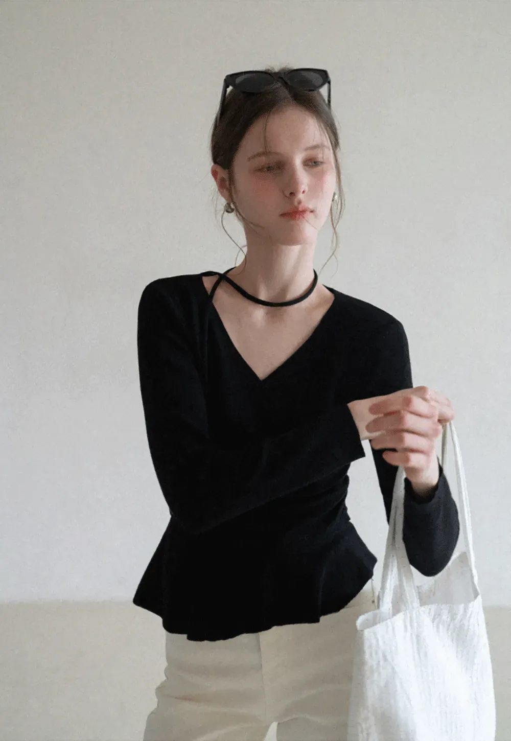 Long sleeve wrap knit sweater with ruched detail