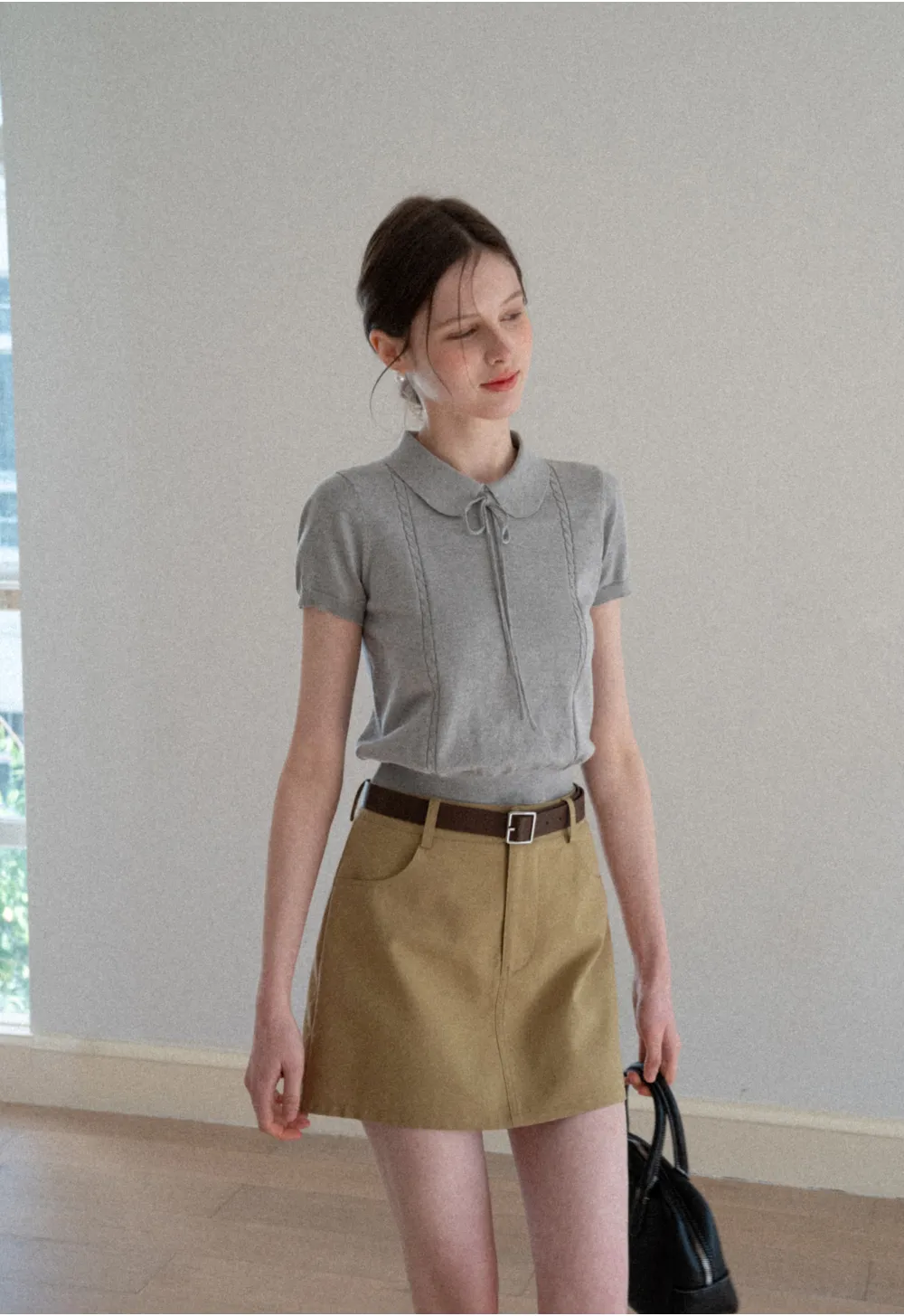A-line mini skirt with front pockets and belt loops
