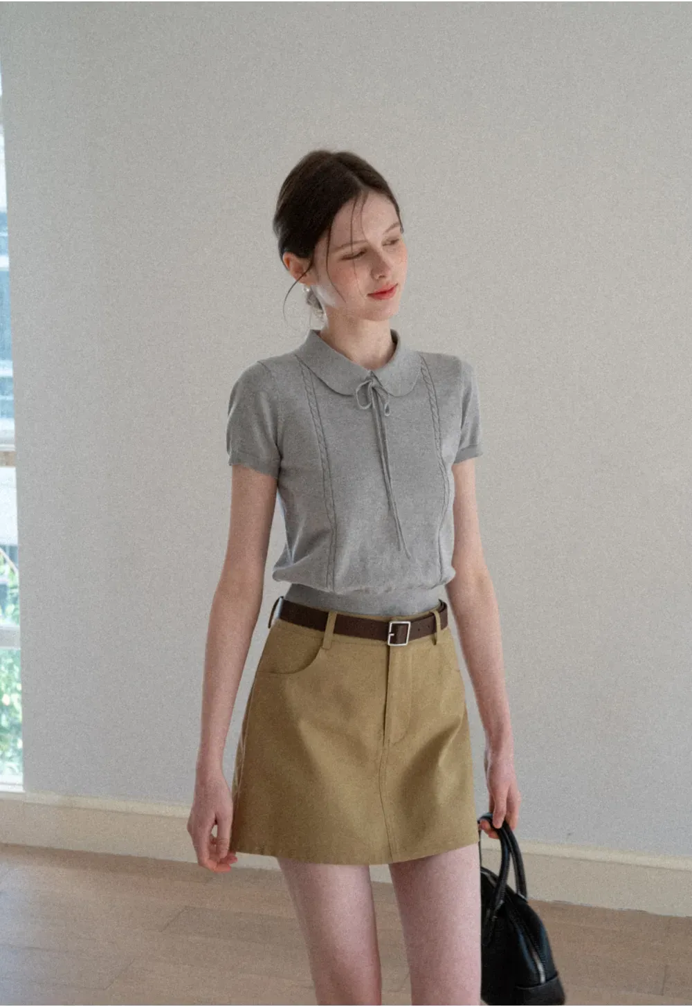 A-line mini skirt with front pockets and belt loops