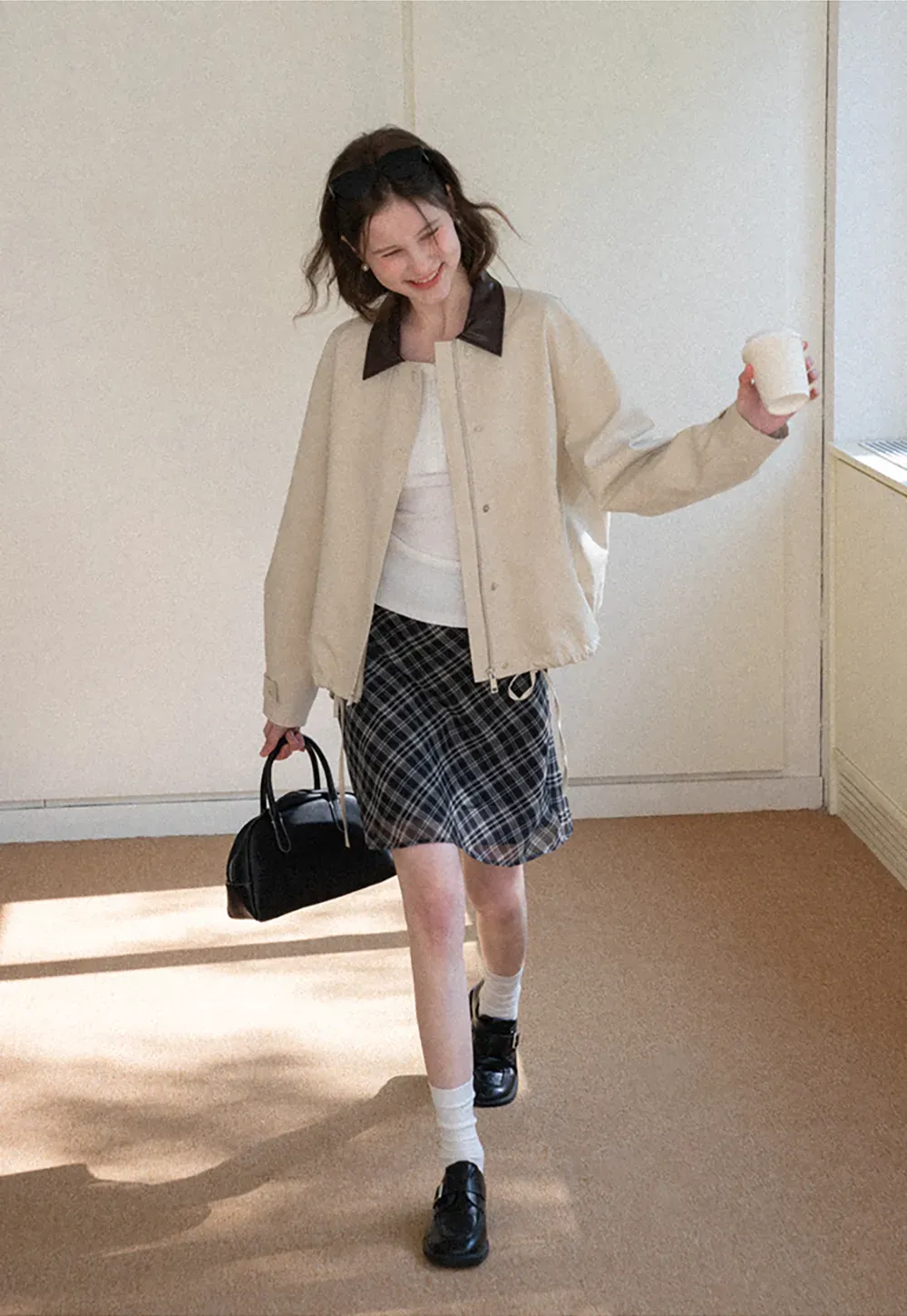 Short jacket with contrast collar and front buttons