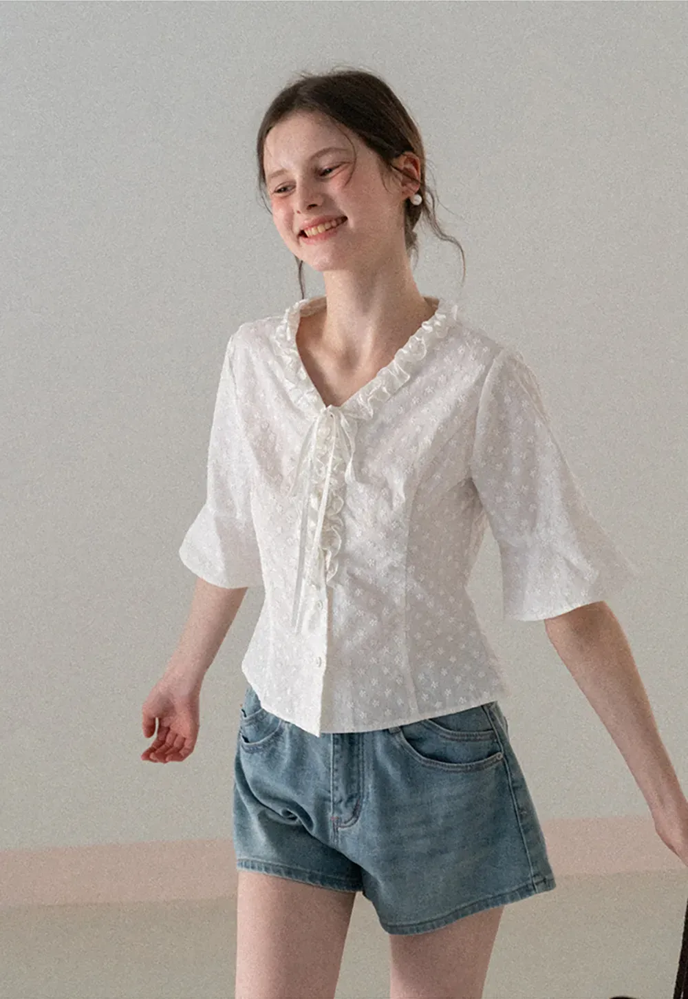 V neck blouse with lace trim and tie front