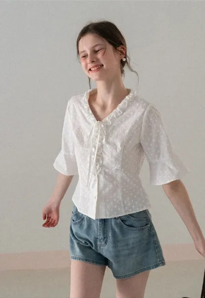 V neck blouse with lace trim and tie front