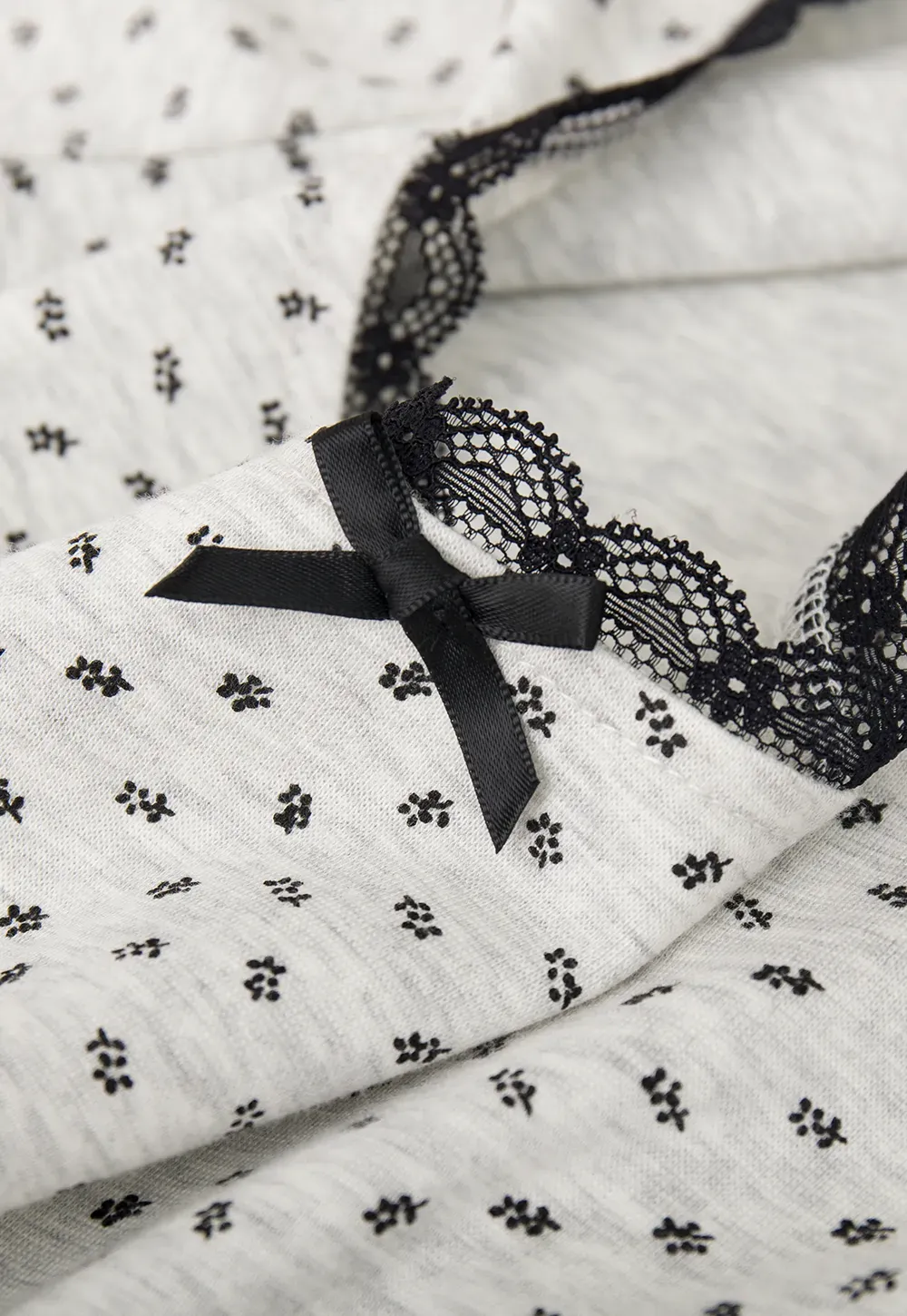 Polka dot dress with lace trim and matching cardigan