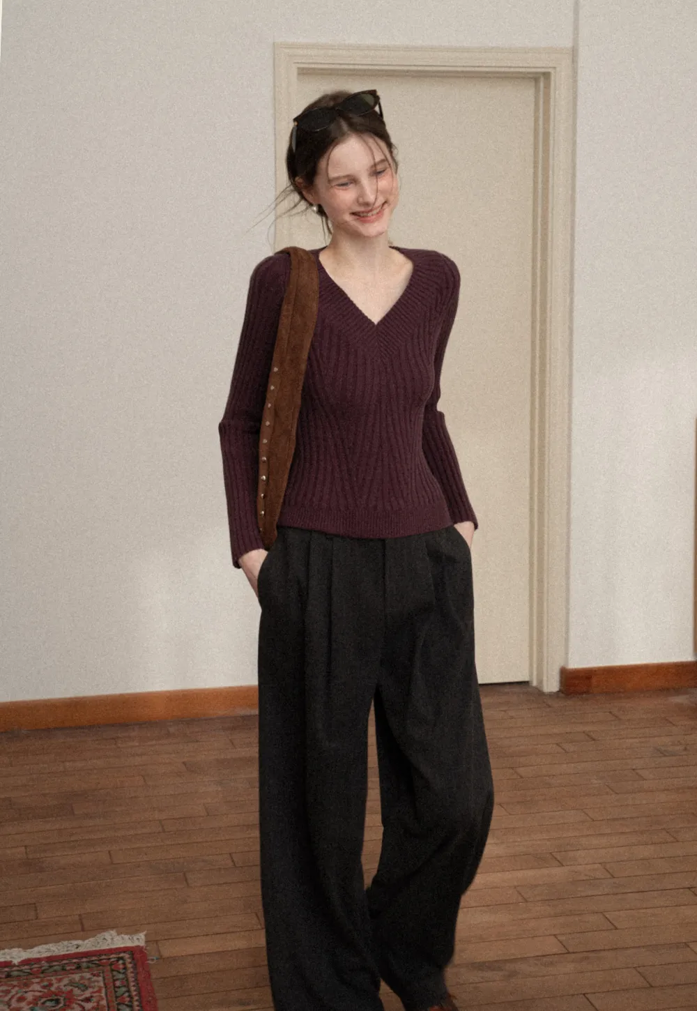 Elegant Ribbed Knit Sweater with V-Neck Design