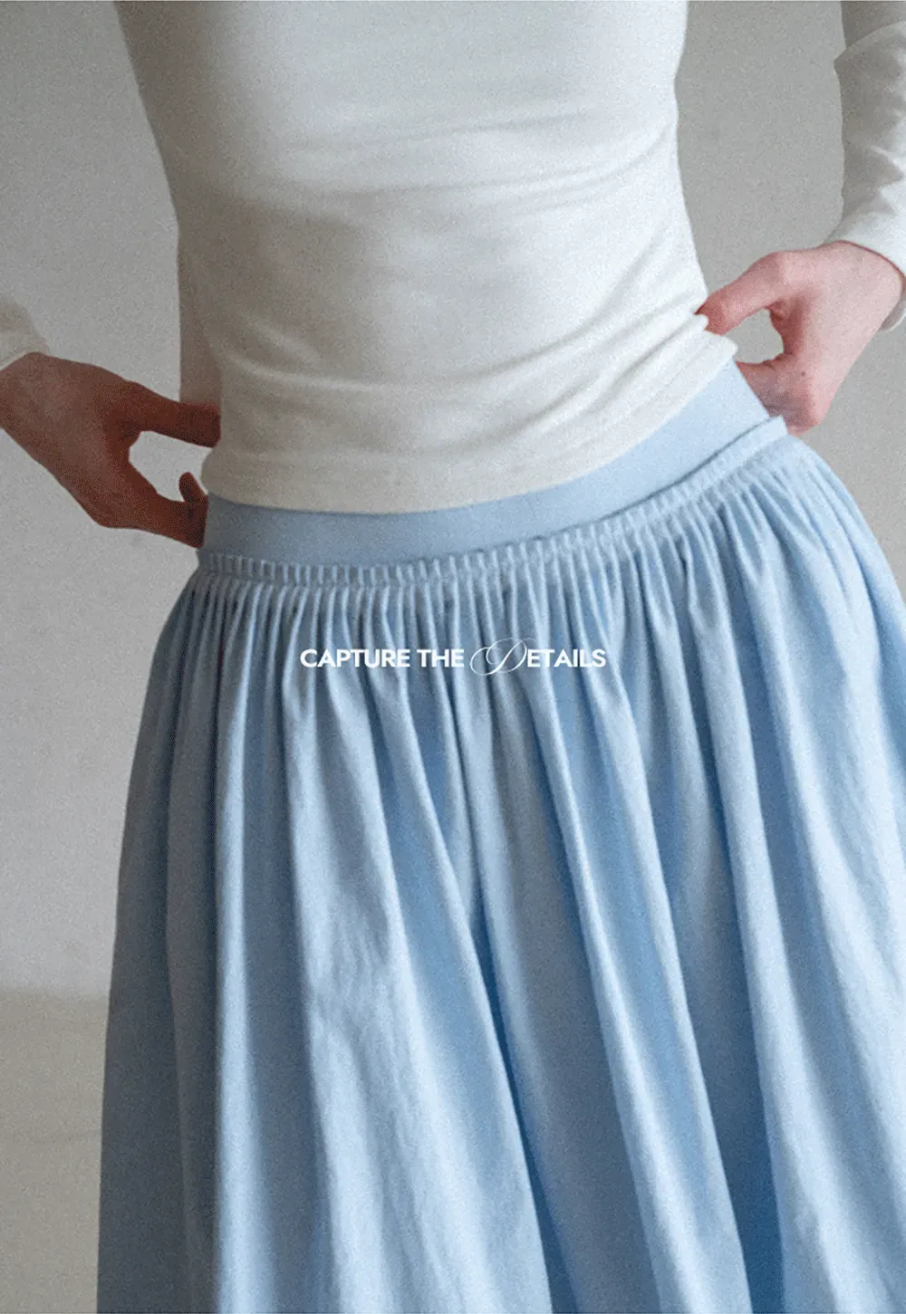 Lightweight pleated midi skirt with elastic waist