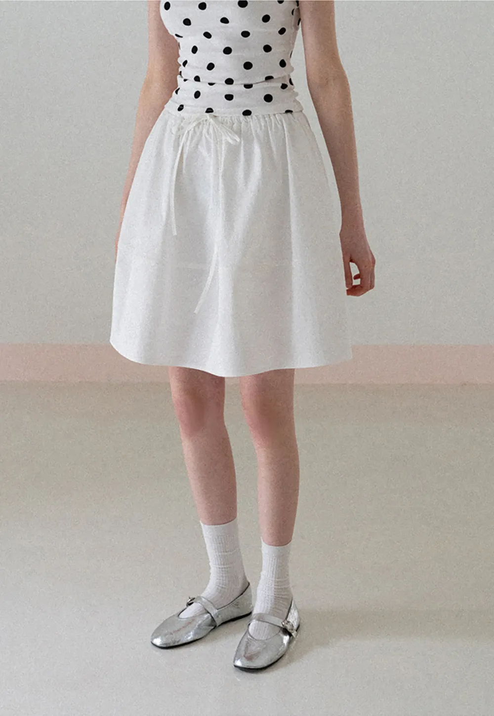 A-line skirt with drawstring waist and layered hem