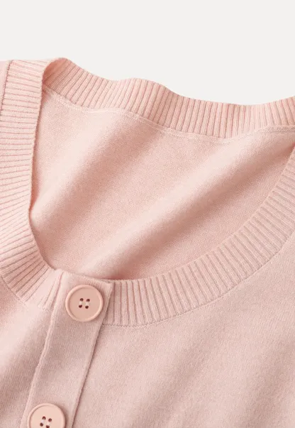 Woolen knit sweater with ribbed hem and cuffs