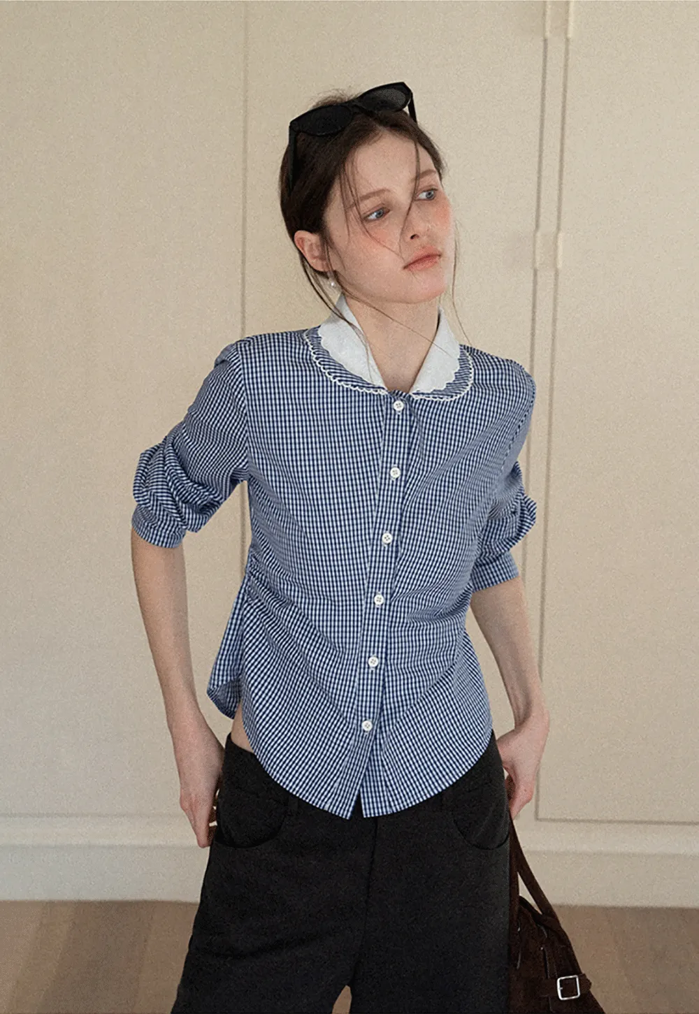 Elegant blouse with scalloped collar and long sleeves for versatile styling