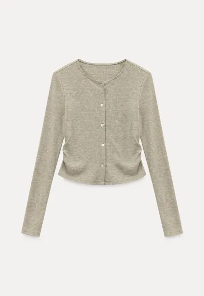 Long sleeve button front top and asymmetrical skirt