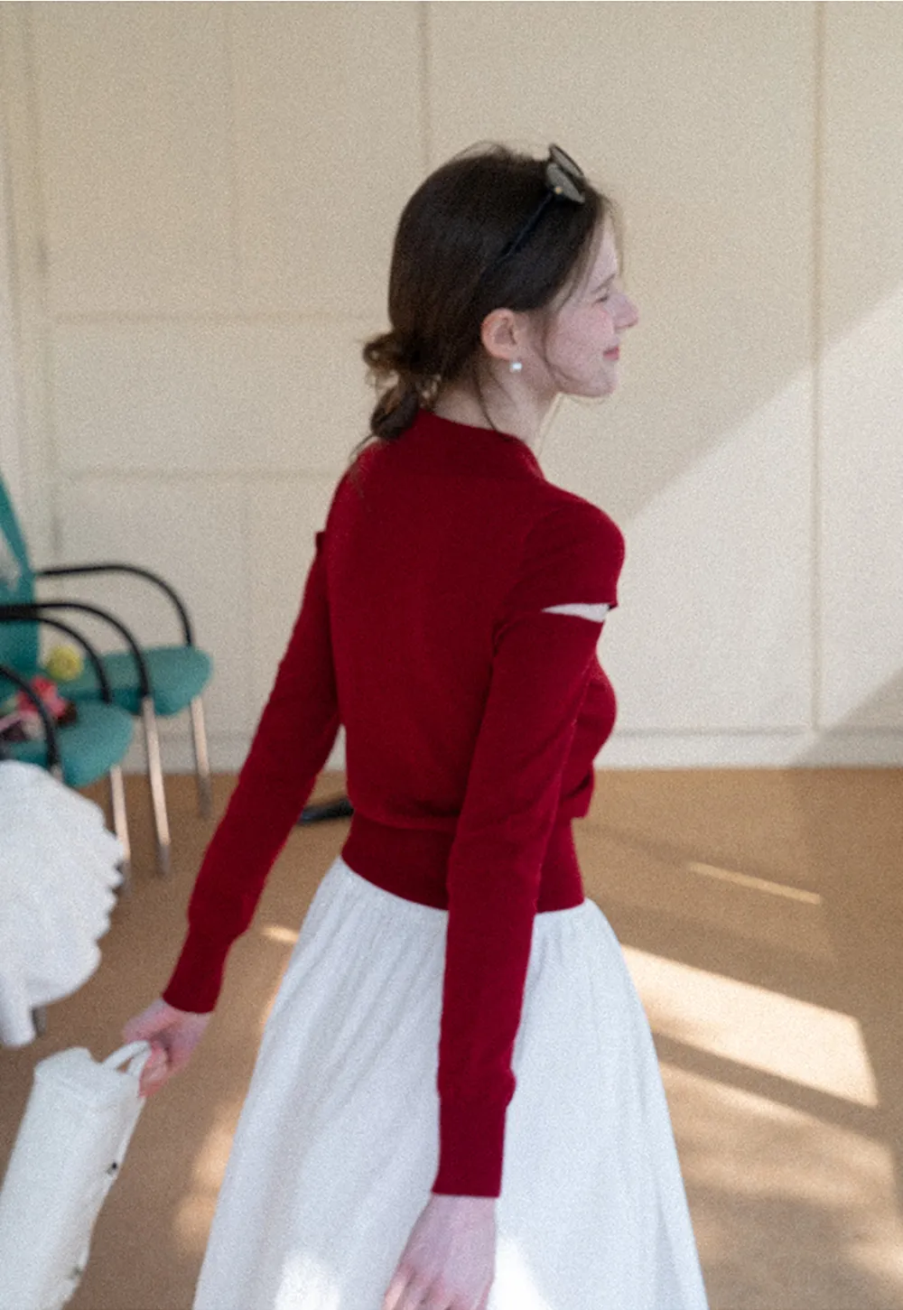 Elegant Knit Sweater with Bow Detail and Cutout Sleeves