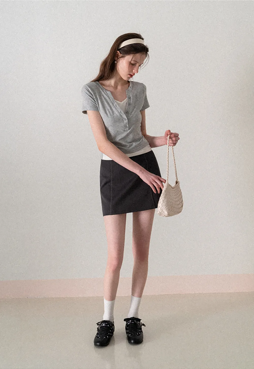 A-line mini skirt with contrast stitching and belt