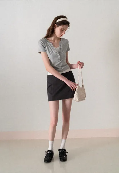 A-line mini skirt with contrast stitching and belt