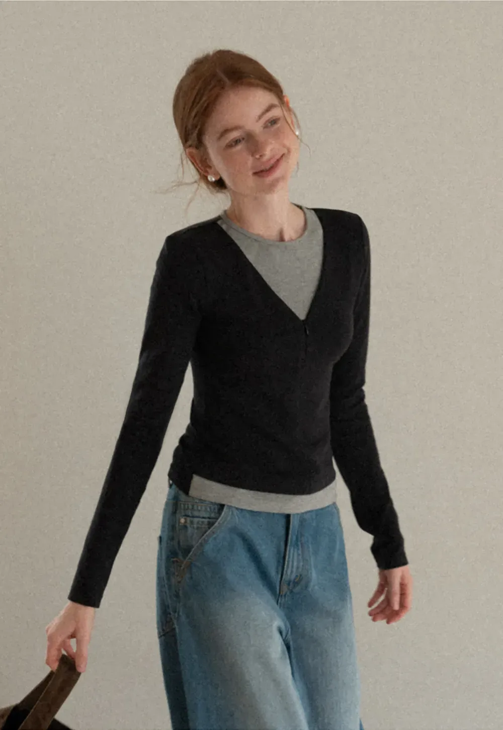 Long sleeve crop top with round neck and hem stitching design