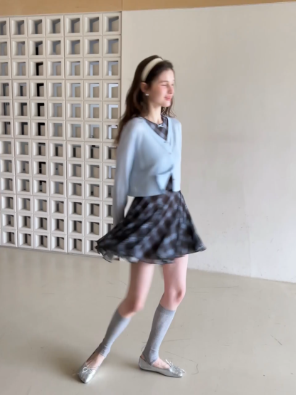 Plaid sleeveless dress with flared skirt