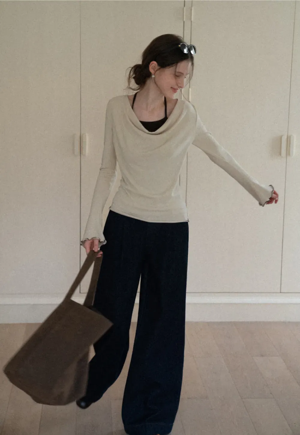 Beige Long-Sleeve Top with Ruffled Hem and Bow Tie Back