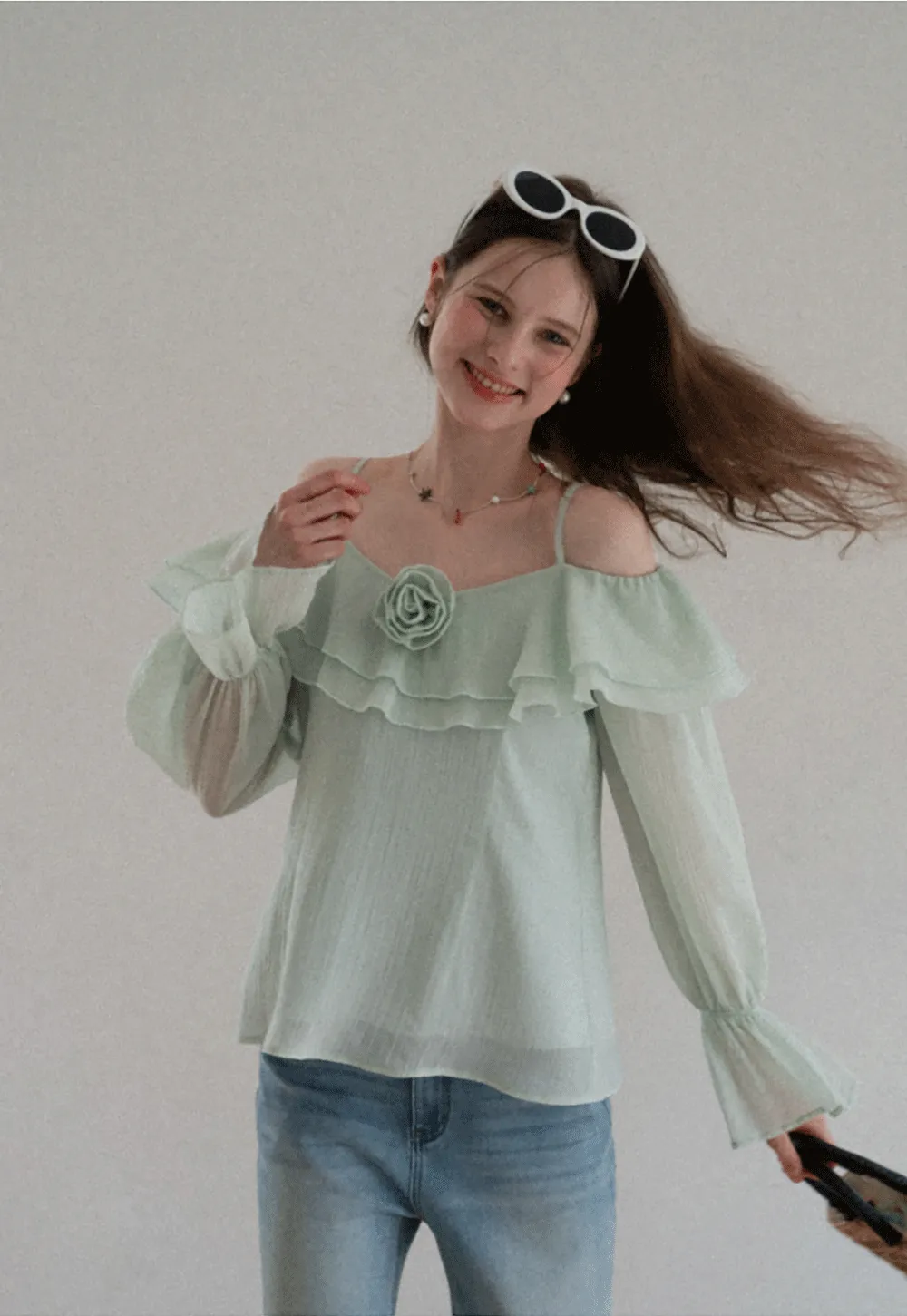 Off Shoulder Blouse with Ruffled Layers and Floral Embellishment