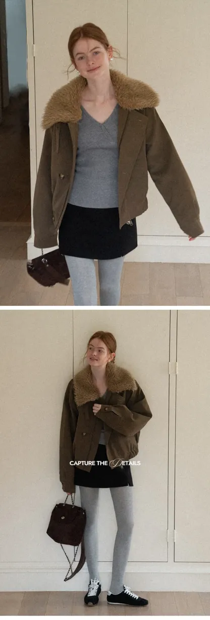 A-line mini skirt with textured fabric and central seam design