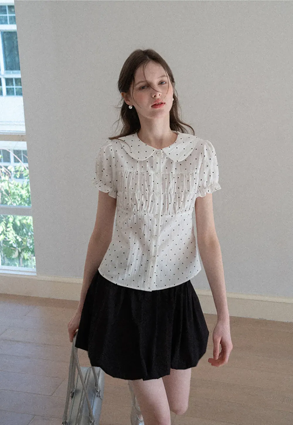 Polka dot shirt with ruffled sleeves and Peter Pan collar