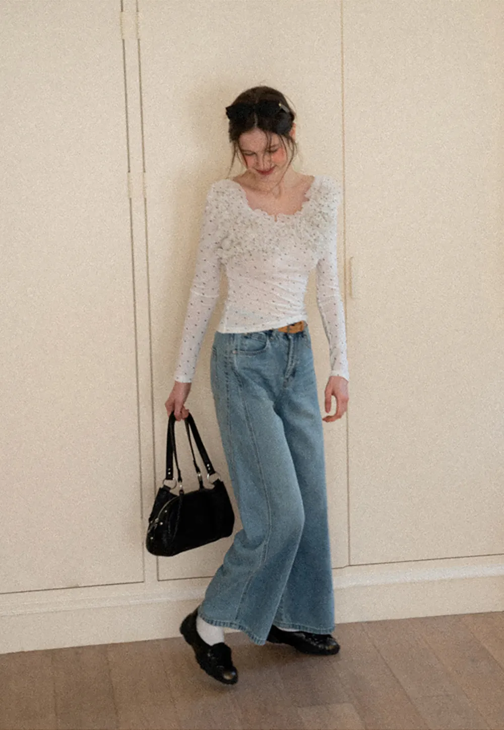 Polka dot long sleeve top with ruffled neckline