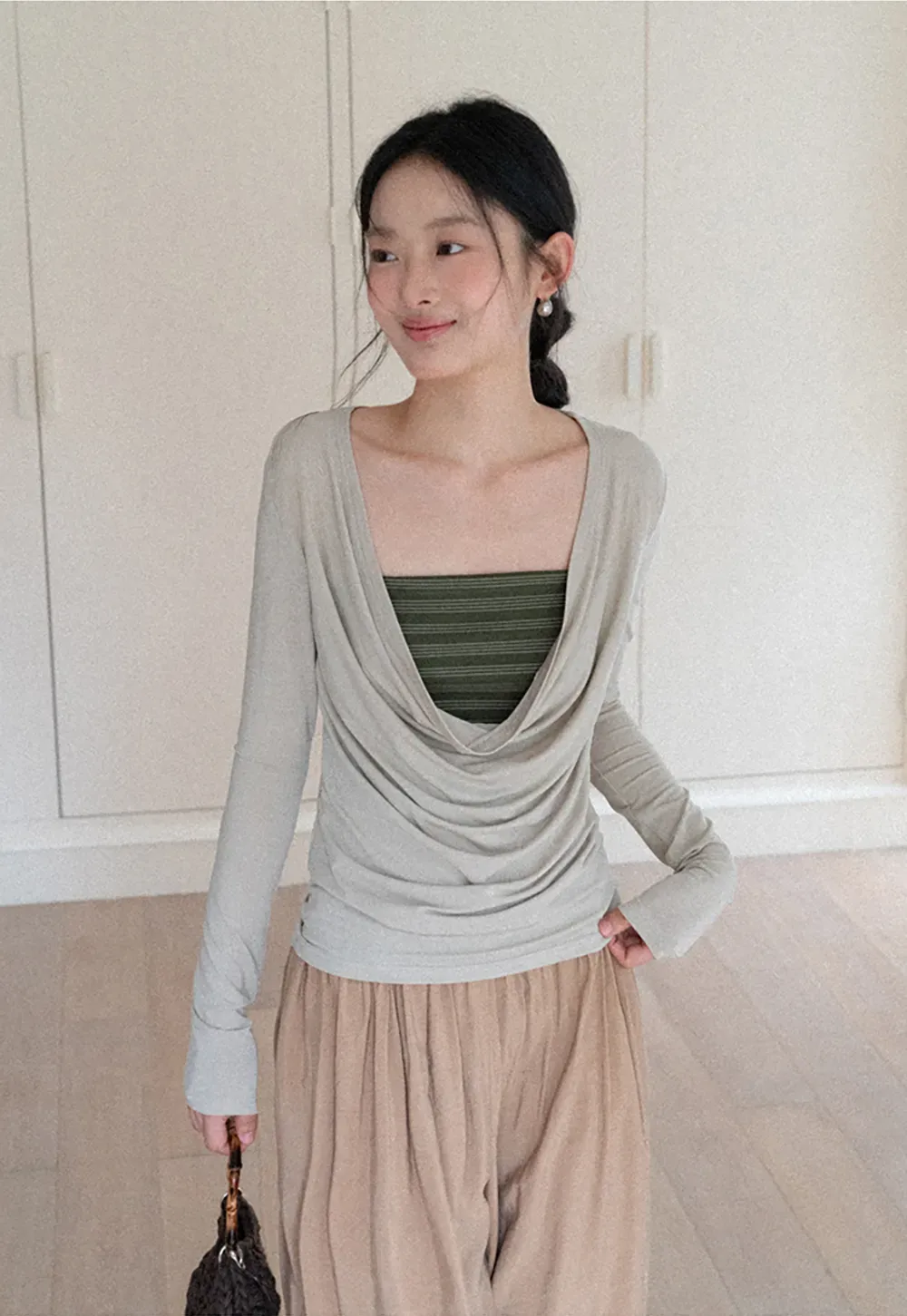 Long sleeve draped neckline top with square cutout