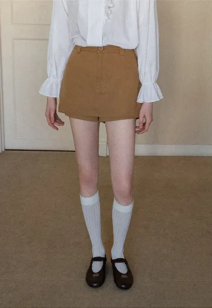 High waist pleated mini skirt with button front design