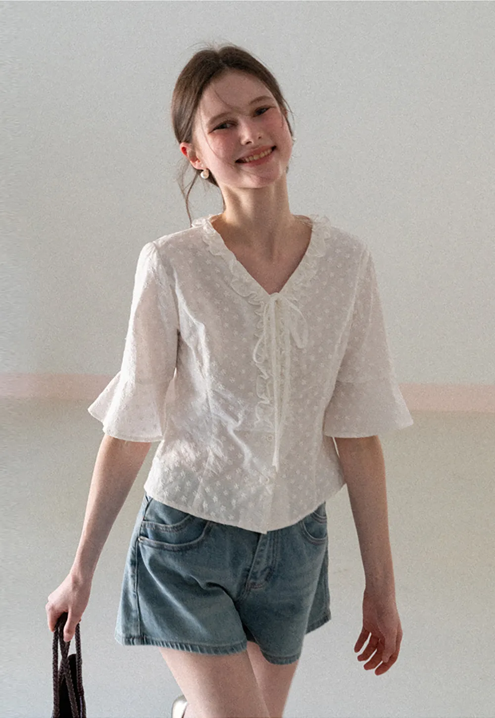 V neck blouse with lace trim and tie front