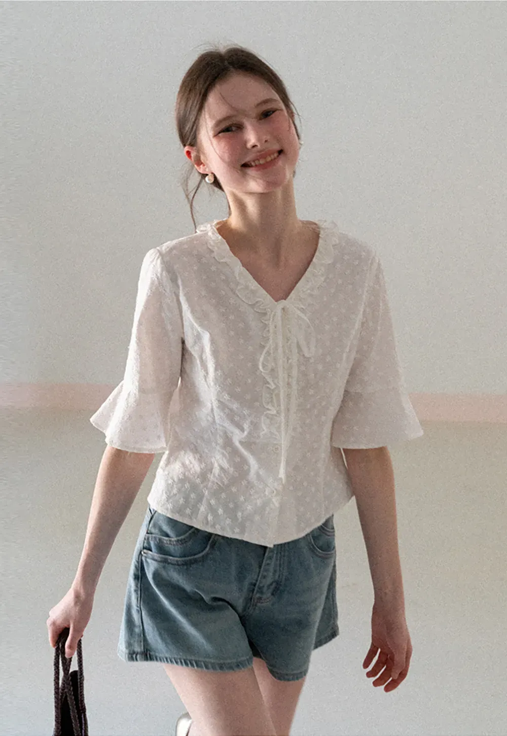 V neck blouse with lace trim and tie front