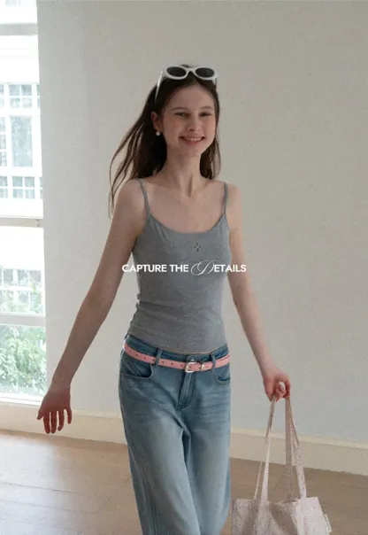 Gray tank top with small embroidered cross detail