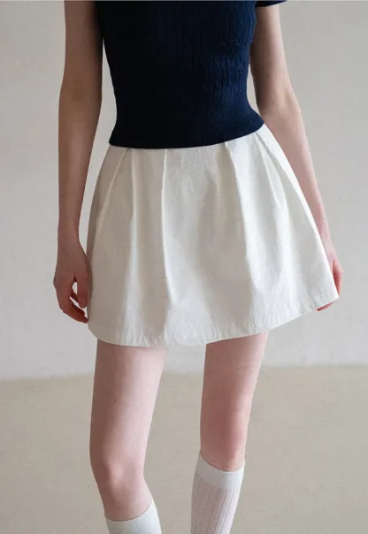 Plaid skirt with pleats and ruffled top