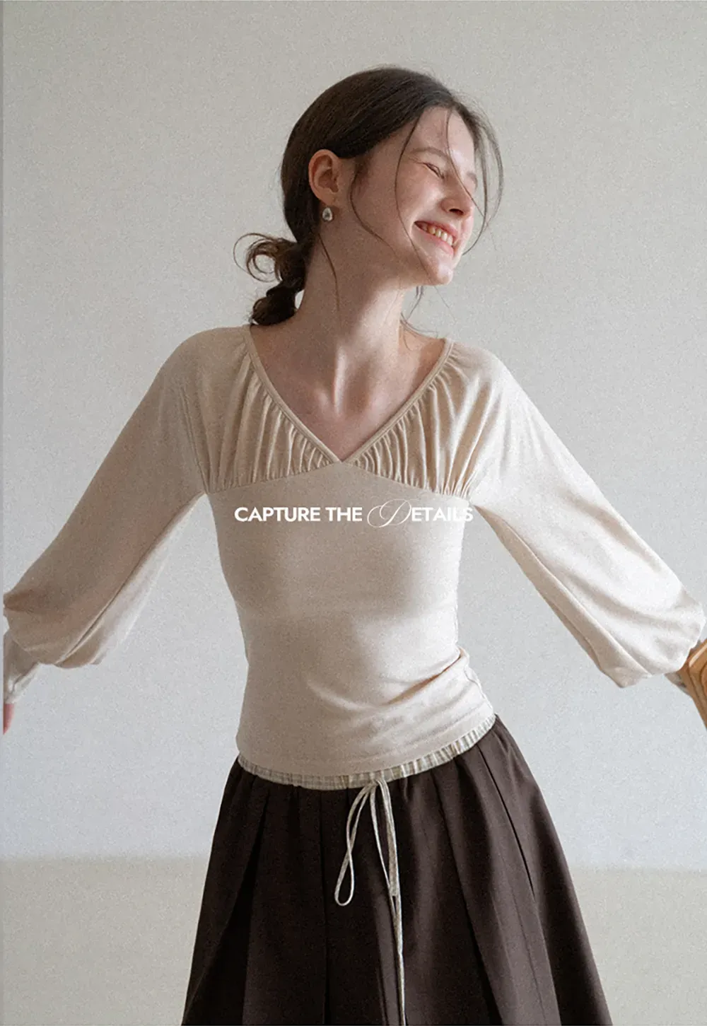 V neck long sleeve top with ruched detail