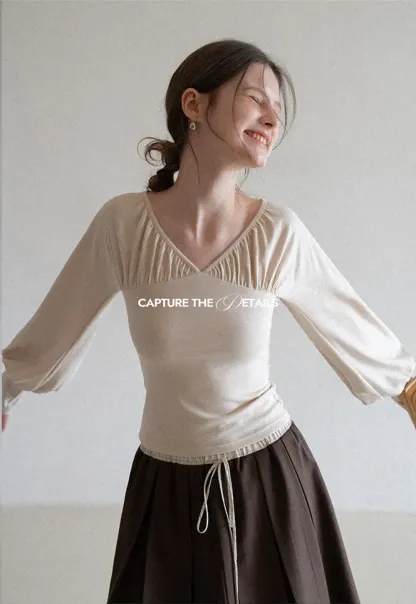 V neck long sleeve top with ruched detail