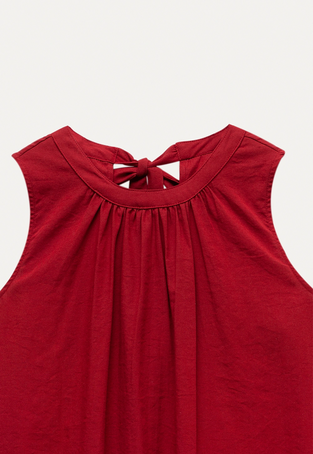 Women’s Sleeveless Ruffle Hem Top with Back Bow Tie