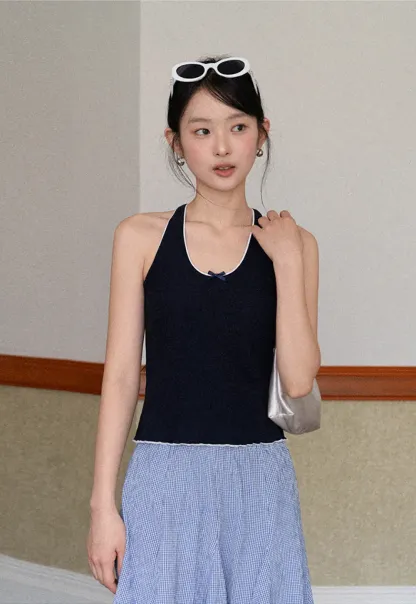 Halter neck tank top with thin straps and bow detail