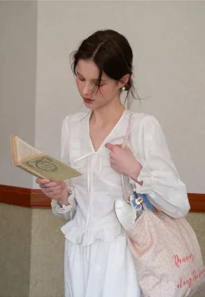 Shirt with ruffled sleeves and layered skirt