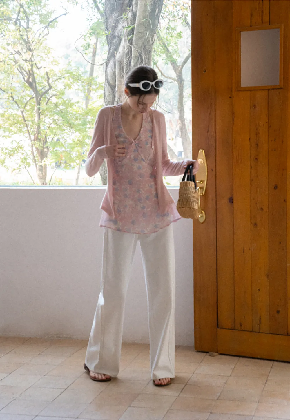 Woolen knit sweater with tie front and floral tank top