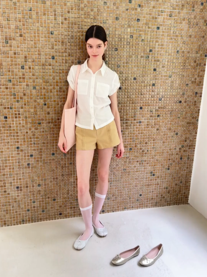 High Waist Pleated Shorts with Button Detailing
