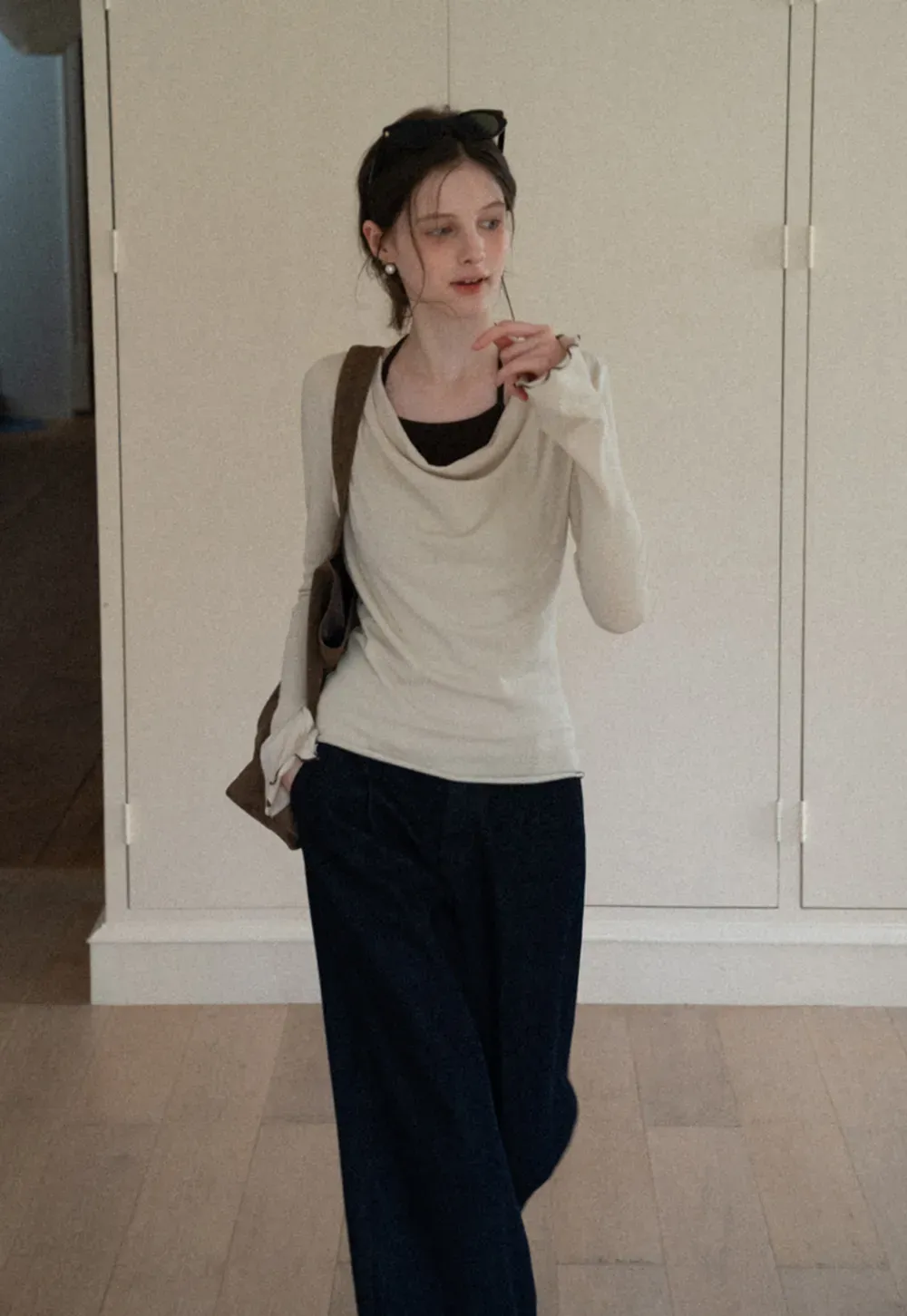 Beige Long-Sleeve Top with Ruffled Hem and Bow Tie Back