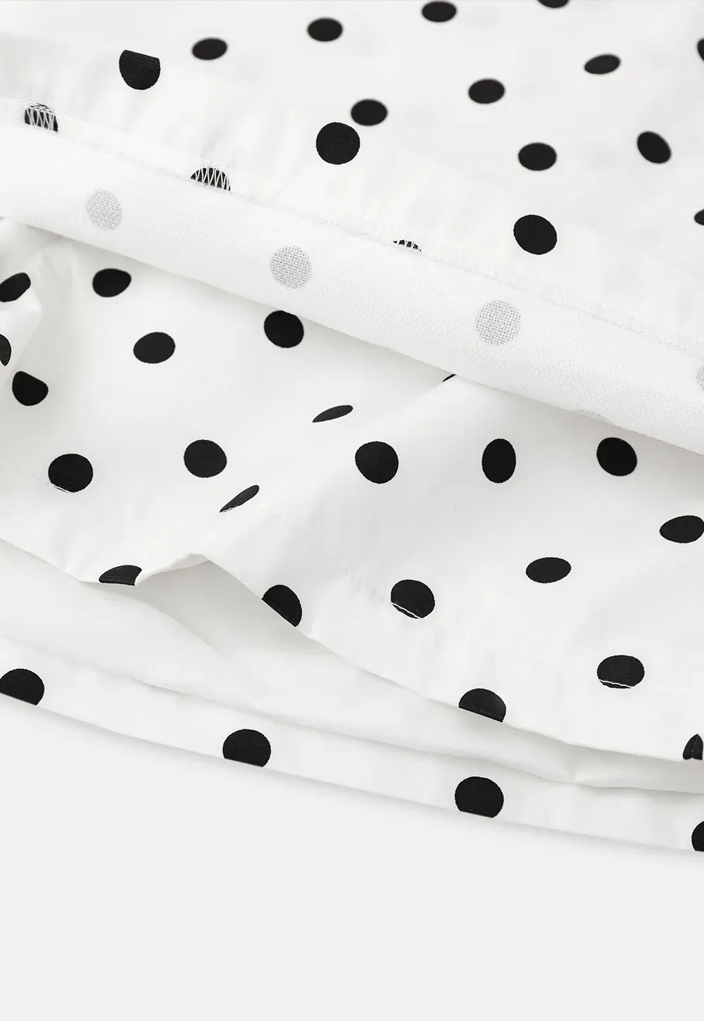 Polka dot mini skirt with layered hem