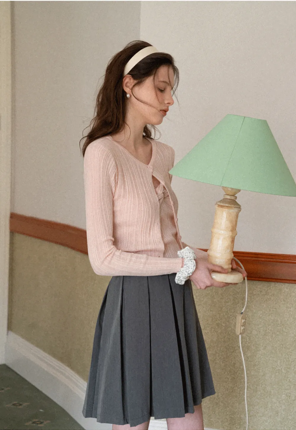 Ribbed knit sweater with V neckline and long sleeves