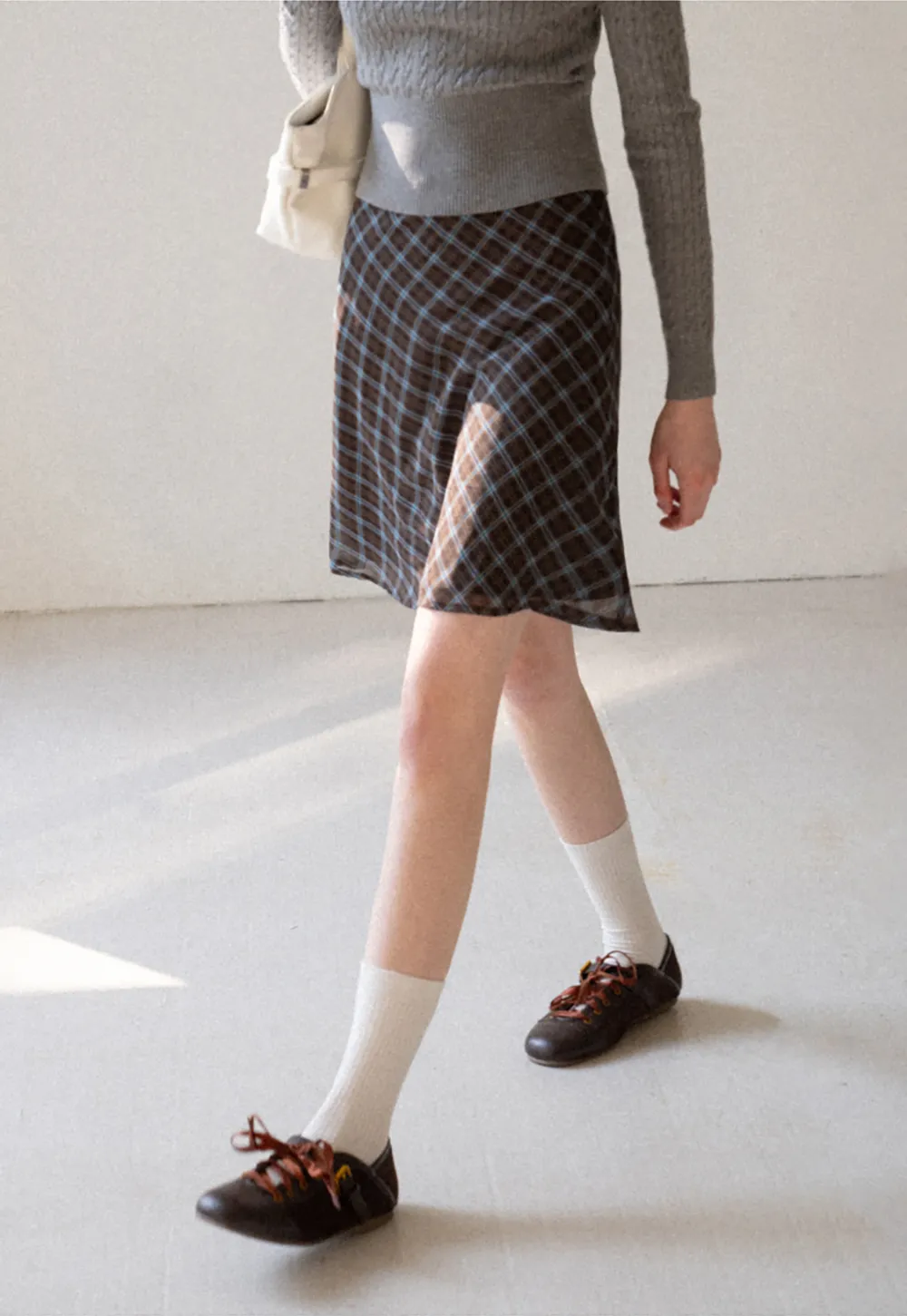 Plaid Skirt with Flowy Hem Design