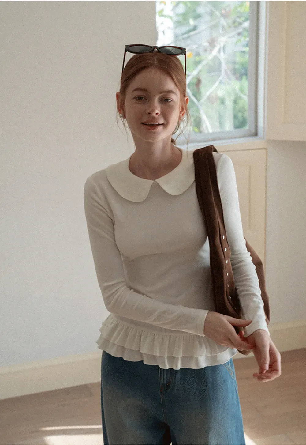 Elegant Long Sleeve Top with Ruffled Hem and Collar Design