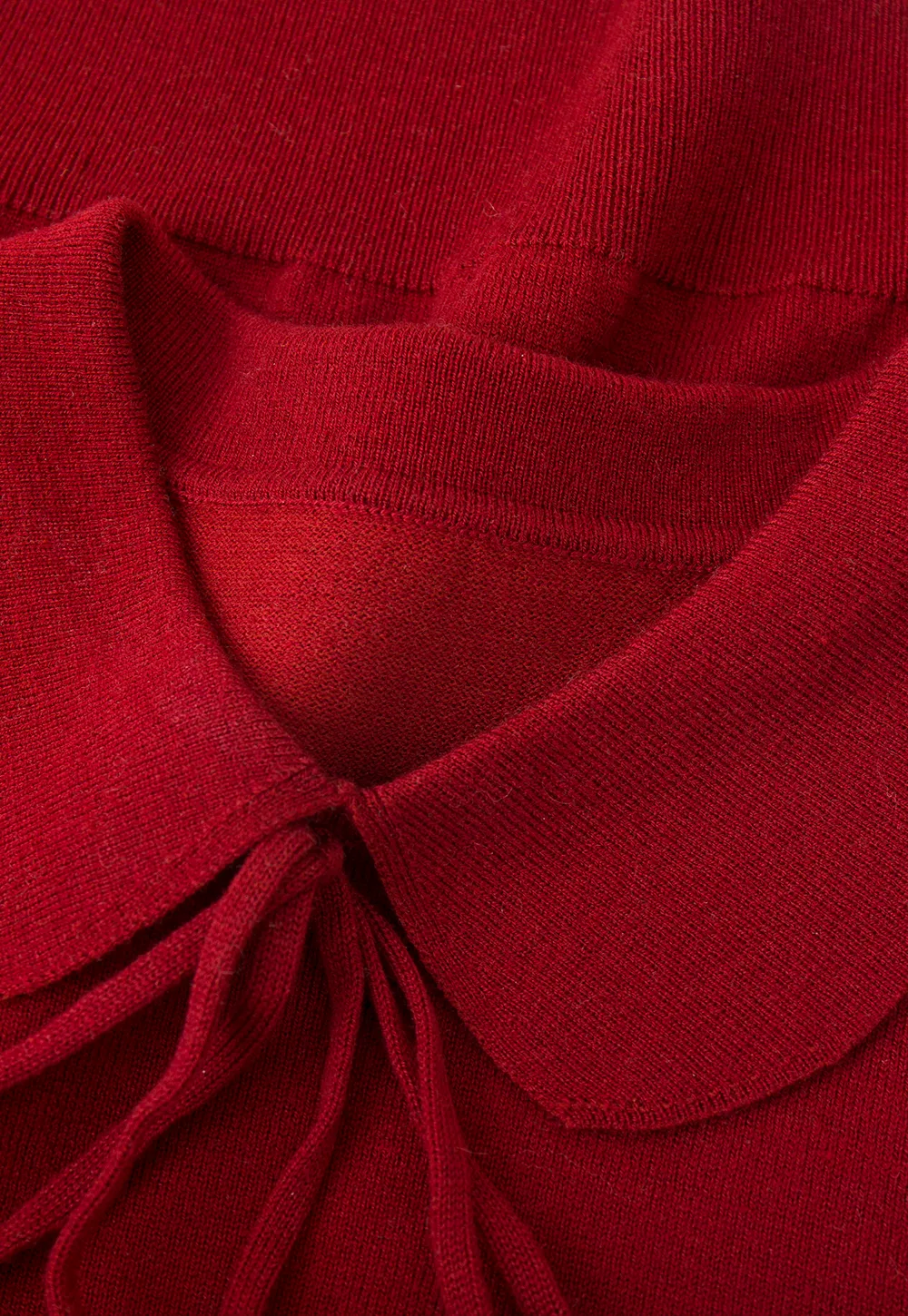 Elegant Knit Sweater with Bow Detail and Cutout Sleeves