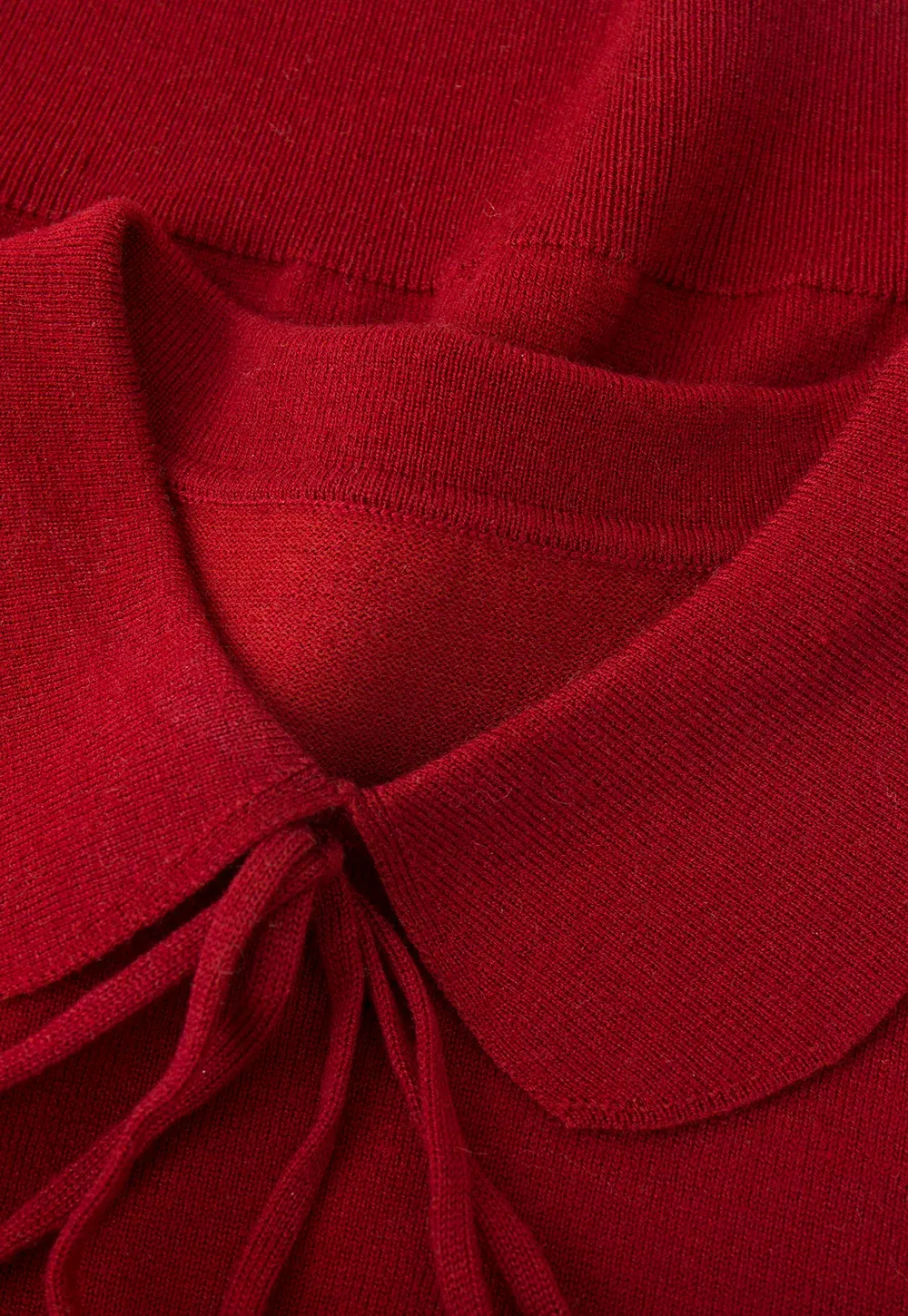 Elegant Knit Sweater with Bow Detail and Cutout Sleeves