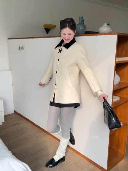 Elegant Wool Coat with Bow Detail and Contrasting Collar