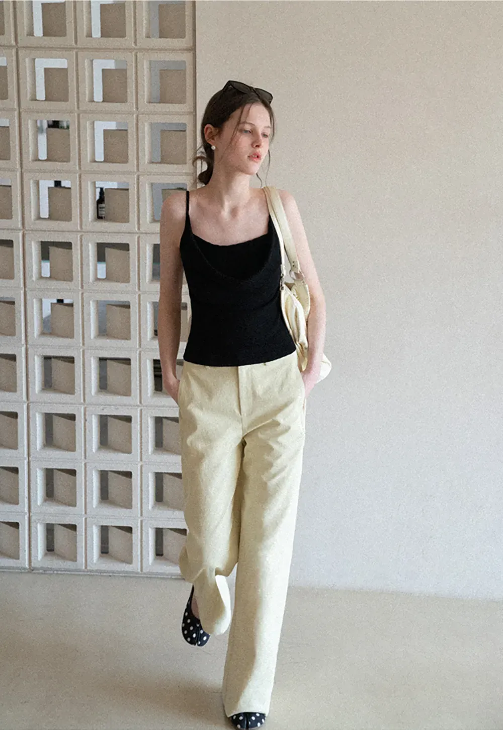 Silk-like tank top with thin straps and draped neckline