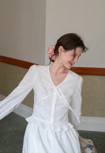 Shirt with ruffled sleeves and layered skirt