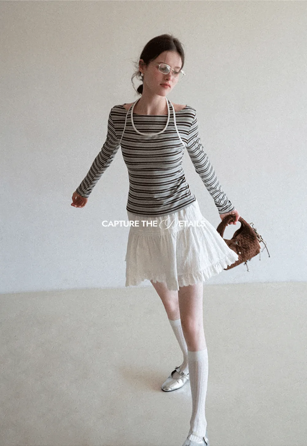 Long sleeve striped top with halter neck detail