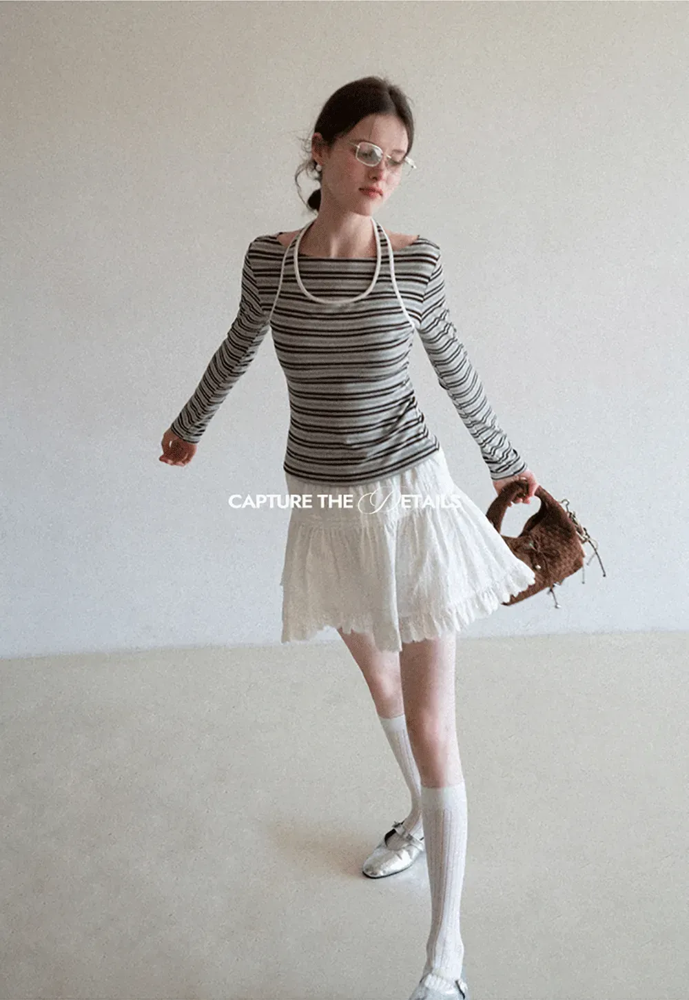 Long sleeve striped top with halter neck detail