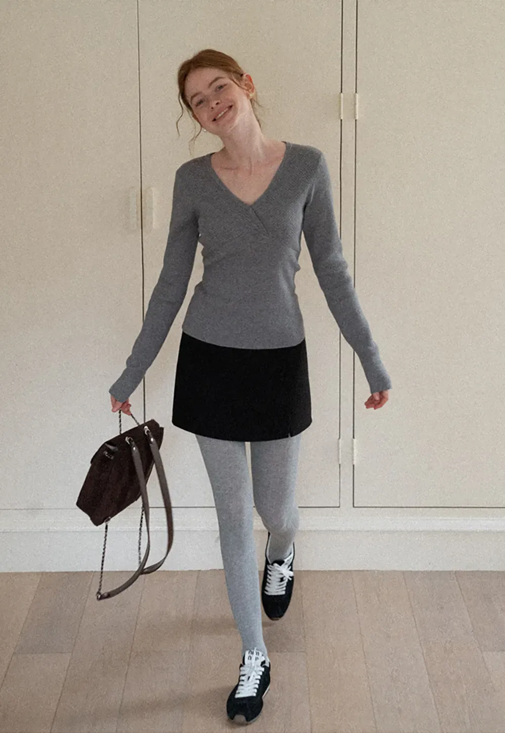 A-line mini skirt with textured fabric and central seam design