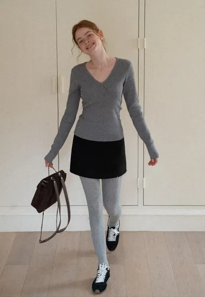 A-line mini skirt with textured fabric and central seam design